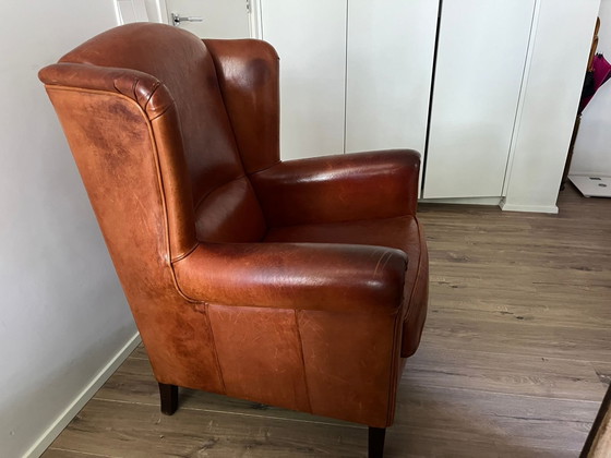 Image 1 of Poltrona con orecchie in pelle