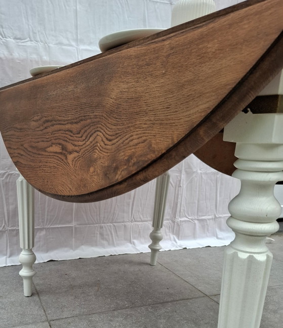 Image 1 of 🪵 Solid oak table with drop leaves — white lacquered legs — vintage chic style