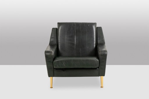 Airborne. Een paar groene leren fauteuils. Jaren 50.