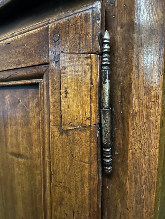 Image 1 of A very small rustic walnut sideboard