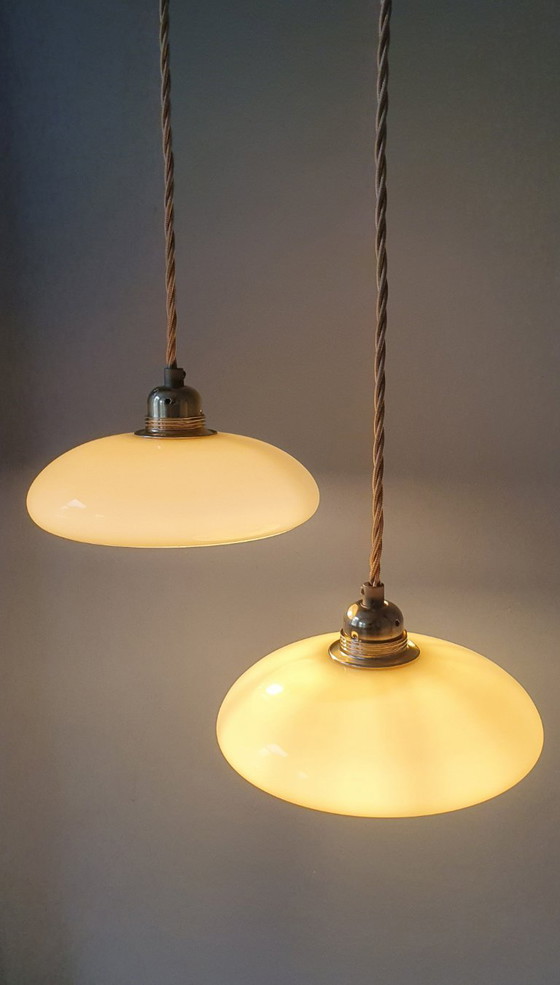 Image 1 of Vintage French pendant lamp set - of pastel yellow opaline glass.