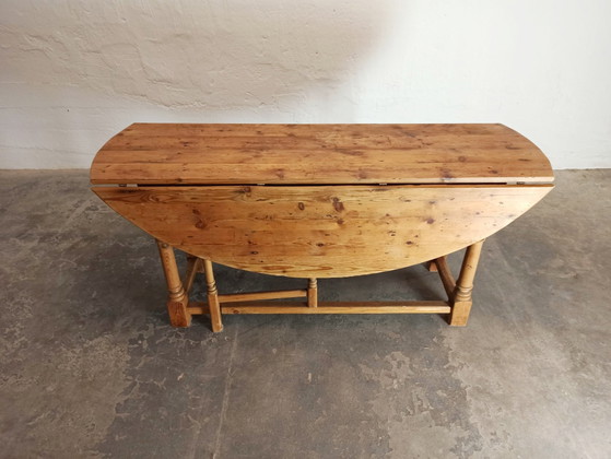 Image 1 of Vintage pine gateleg drop leaf dining table 