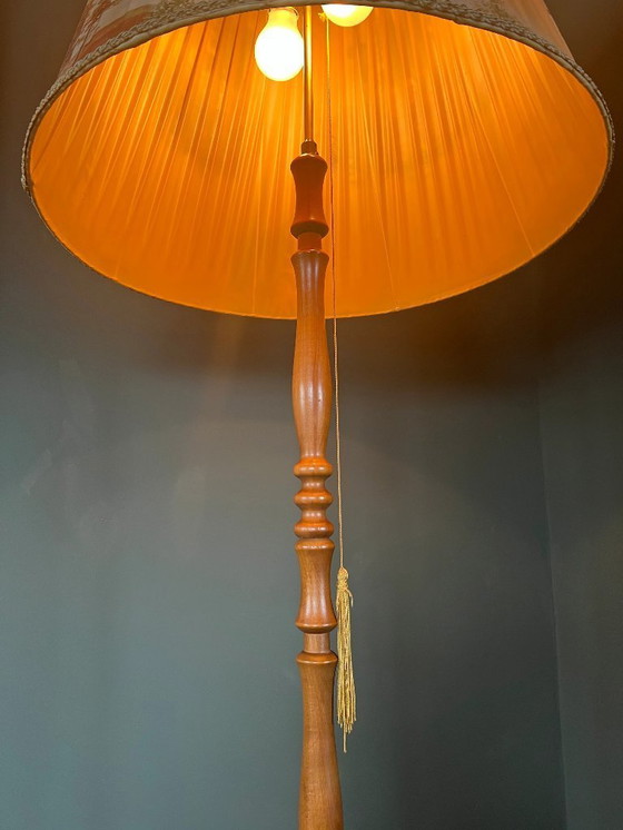Image 1 of Vintage Mid - Century floor lamp from the 1960s. Lampshade with hunting motifs and turned wooden base in top condition.