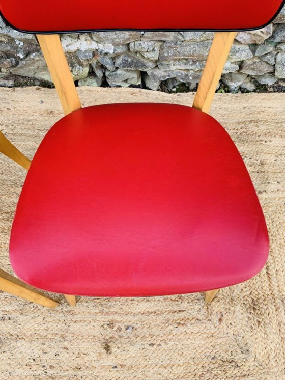 Image 1 of Ein Paar rote Stühle