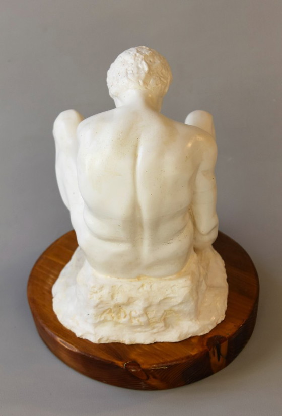 Image 1 of Sculpture of a seated man. Classical male sculpture. Male figure.