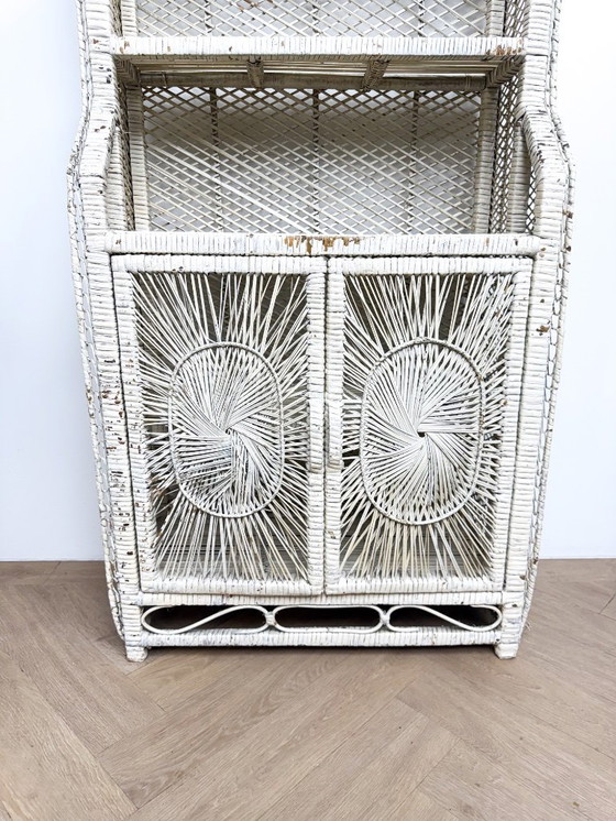 Image 1 of Vintage rattan wicker arch cabinet with sunflower motif