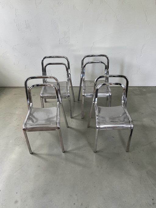 Set di 4 sedie da pranzo di design in metallo cromato Arrben, prodotte in Italia, impilabili.