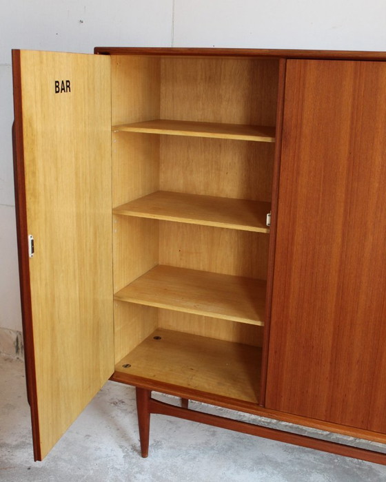 Image 1 of XXL teak highboard, German design classic by Heinrich Rietsenpatt