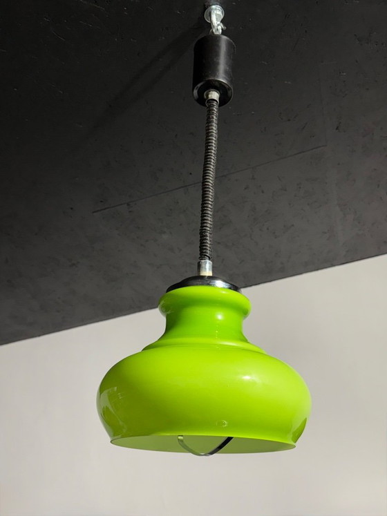 Image 1 of Lampada a sospensione in stile Space Age con paralume in vetro verde, modello Rolly, 1973.