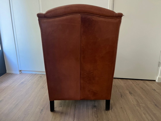 Image 1 of Poltrona con orecchie in pelle