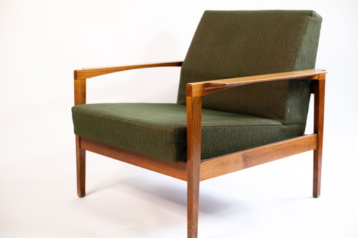 Mid-Century Loungesessel aus Holz und grünem Stoff