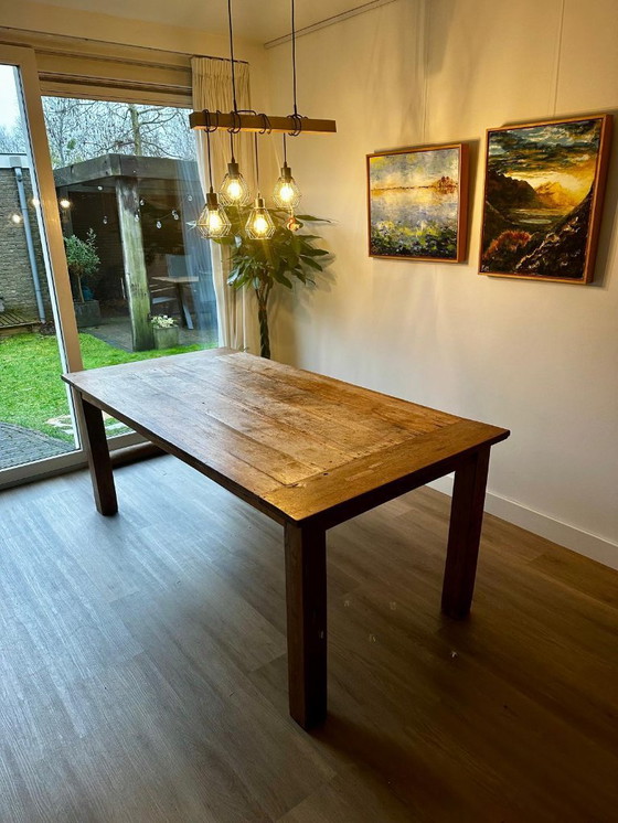 Image 1 of Robust wooden dining table