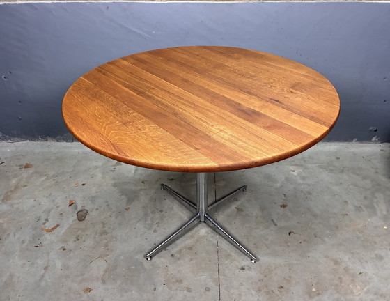 Image 1 of Round oak dining table with chrome base, vintage