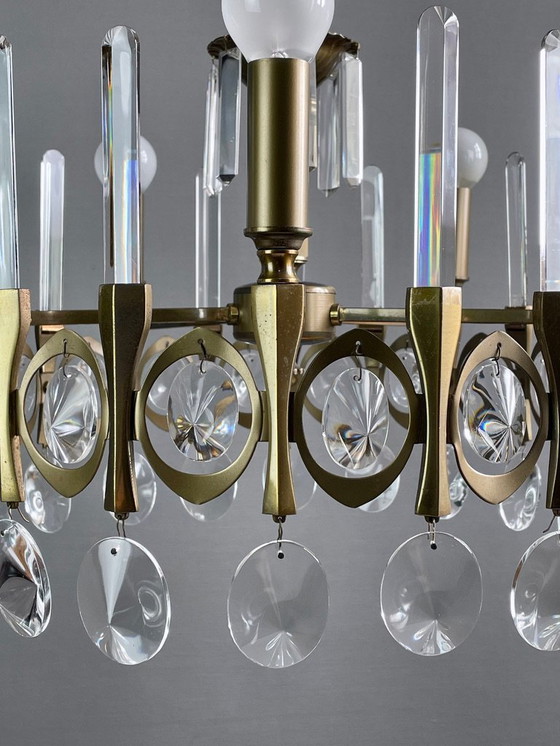 Image 1 of Gaetano Sciolari, five-light chandelier from the "Ovali" series, 1960s. Burnished brass frame and original optical crystals.