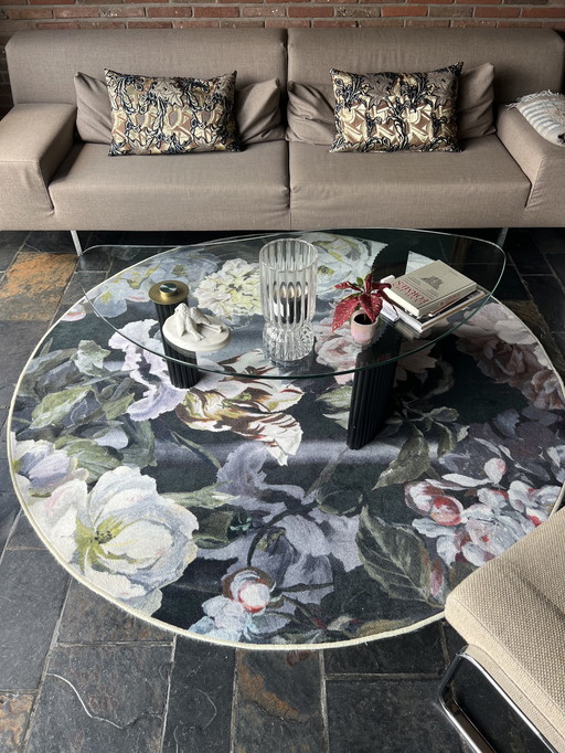 Round floral rug Designers Guild