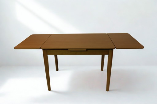 Vintage extendable wooden dining table