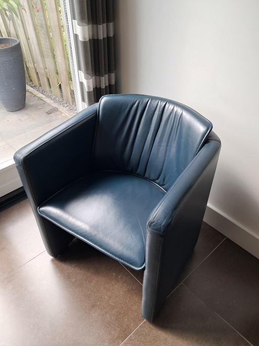 2 leather armchairs