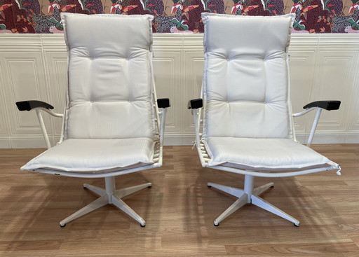 Duo of metal and Bakelite armchairs, 1960 design.