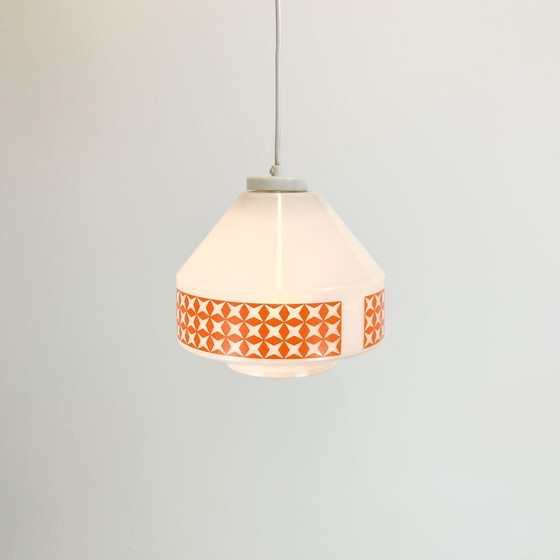 Image 1 of pendant lamp, opal glass with orange pattern, GDR of the 1970s