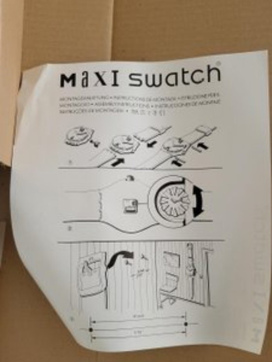 Image 1 of Orologio da parete Jean Michel Folon di Swatch 1993