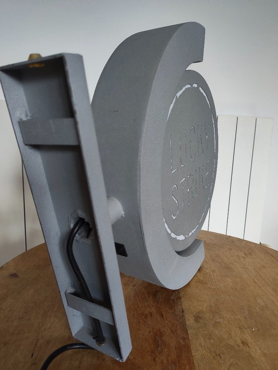 Image 1 of Vintage draaiend lichtreclamebord Lucky Strike