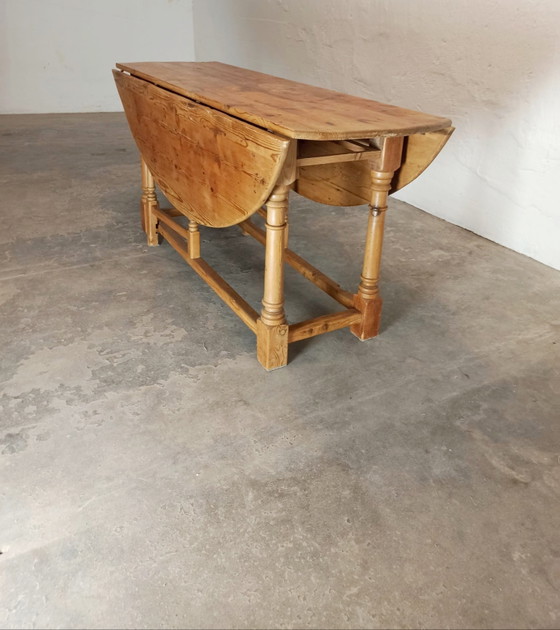 Image 1 of Vintage pine gateleg drop leaf dining table 