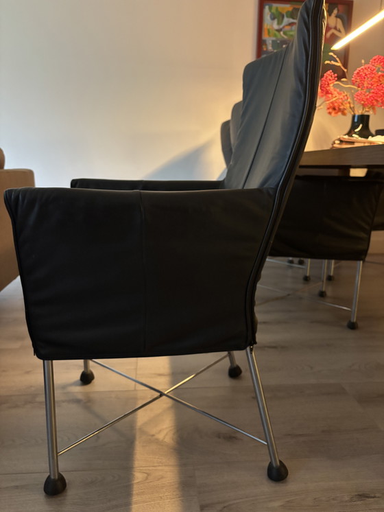 Image 1 of 6 zwarte Montis Chaplin stoelen met rvs onderstel