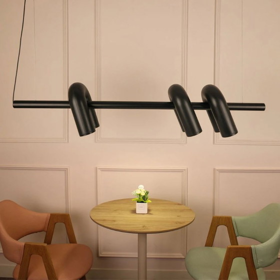 Image 1 of Lámpara de araña de comedor Cirkus con un diseño tubular arquitectónico moderno