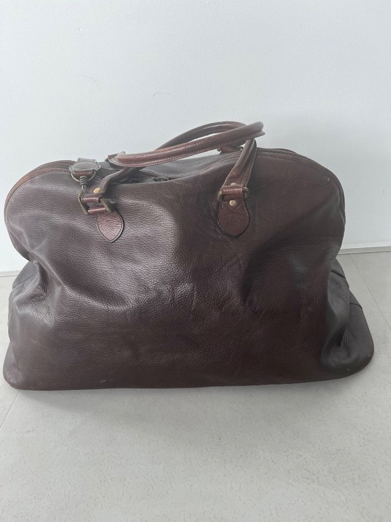 Image 1 of brown leather travel bag from Candy Corson leather atelier Amsterdam
