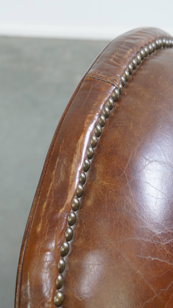 Image 1 of Rundleren design fauteuil/ armchair met ronde vormen en siernagels