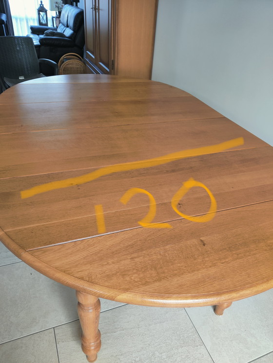 Image 1 of In large adjustable oak table