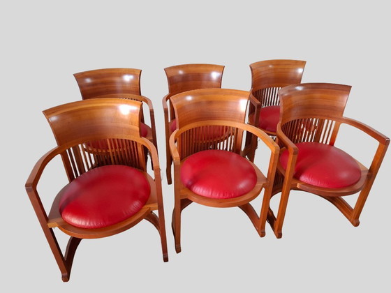 Image 1 of Frank Lloyd Wright Husser Dining Table with Six Barrel Chairs for Cassina in Cherry Wood and Red Leather