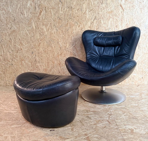 Natuzzi fauteuil met bijpassende voetenbank
