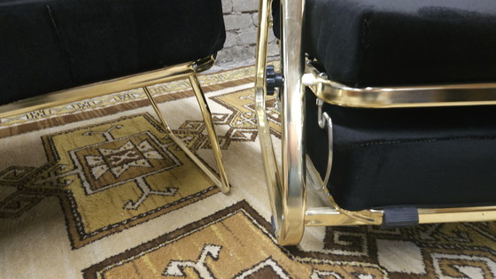 Image 1 of Paire de fauteuils noir système "Morris "1970