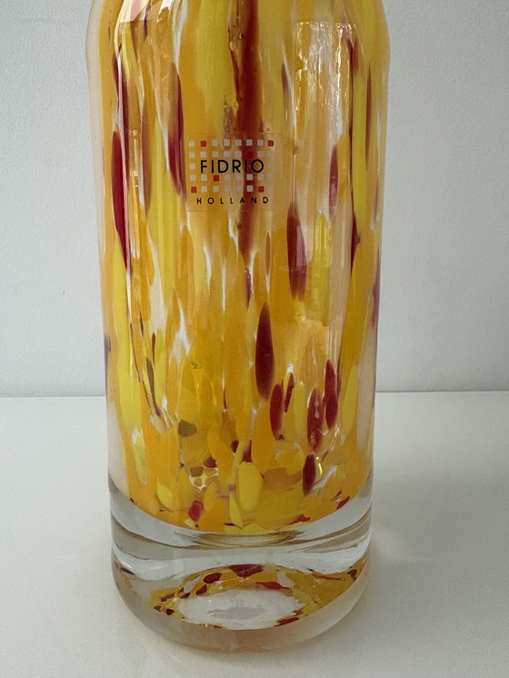Image 1 of Fidrio Exclusive Collection bottle vase, in yellow, red, and white glass