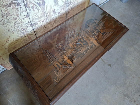 Image 1 of Antique Asian coffee table with beautiful wood carving, dimensions: 100x45cm and 41cm high.
