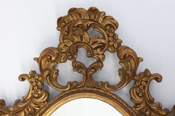 Image 1 of Baroque style oval wall mirror in gilded wood, France