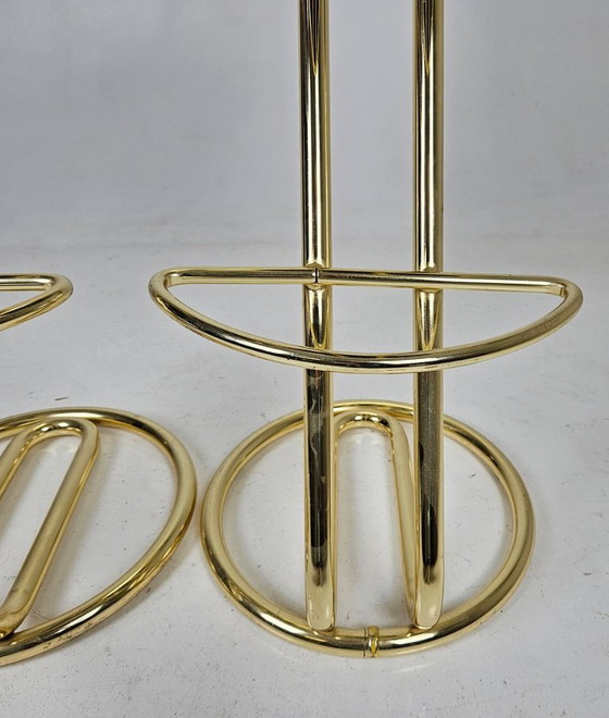 Image 1 of two bar stools, distinguished by their clean lines, high-quality craftsmanship, and timeless elegance.