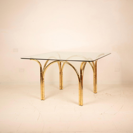 Table de salle à manger italienne méditerranéenne en acier plaqué laiton effet bambou et plateau en verre (photo 10 of 21)