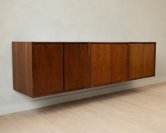 Image 1 of Poul Cadovius zwevend wanddressoir van palissanderhout, van CADO, jaren 1960.