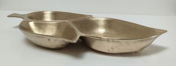 Image 1 of grote vintage bladvormige messing zaklepel