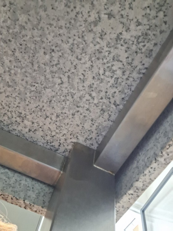 Image 1 of Mesa de comedor de granito con patas de acero inoxidable