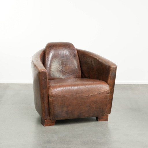 Sillón de cuero de vaca diseño Aviator en un cálido color marrón con un aspecto atemporal