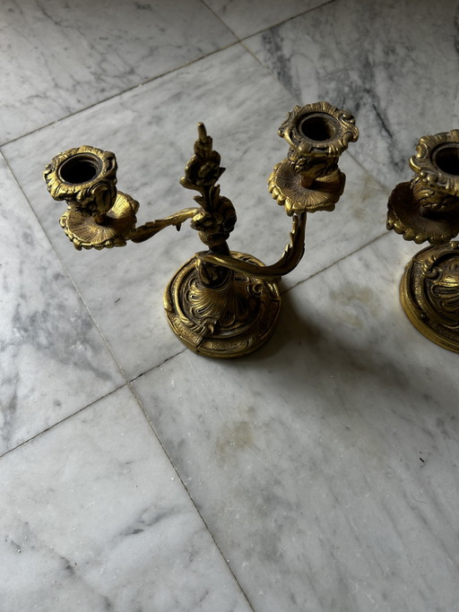 Beautiful antique chandeliers/candlesticks in bronze or gilded spelter, with refined floral rocaille decoration.