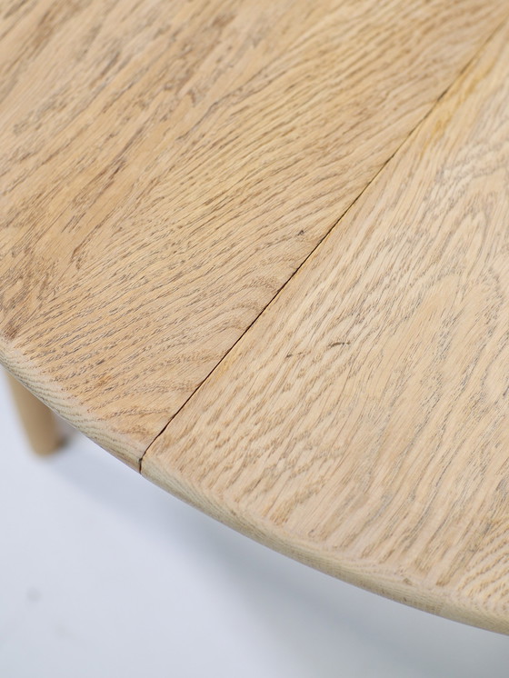 Image 1 of Extendable dining table Henning Kjaernulf oak Danish