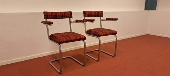 Image 1 of Ensemble de 2 chaises tubulaires avec accoudoirs | style rétro | rouge