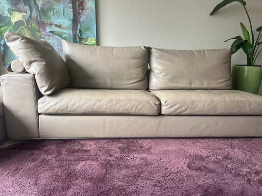 Sofá Flexform con otomana - piel color topo