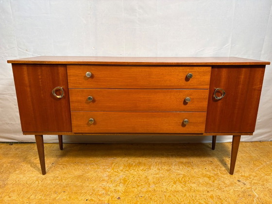 Image 1 of Mid Century Retro Teak Small Sideboard by Schreiber (Circa 1960)  A stylish and compact mid century modern teak sideboard by Sch