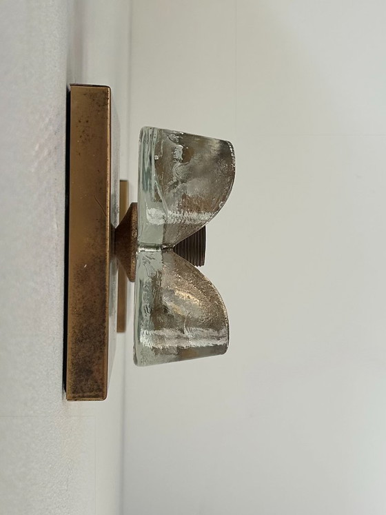 Image 1 of Een paar vintage wandlampen met bloemenmotief, messing en glas, Duitsland, 1970.