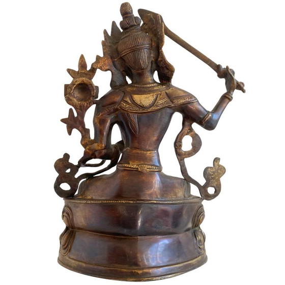 Antigua estatua tibetana de bronce de Manjushri con rastros de dorado lote 170 – Esculturas, Bronze (photo 5 of 15)